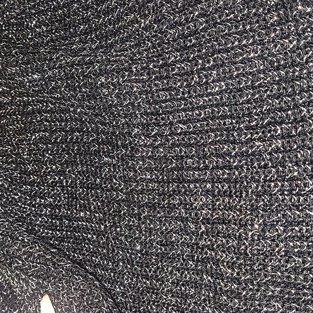 Stylish Black Knit Sweater with Pink Lace-Up Sleeves - Picture 4 of 5